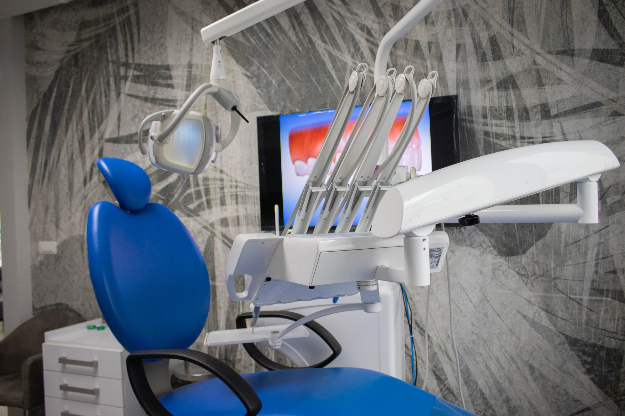 Detailed view of dental chair and instruments