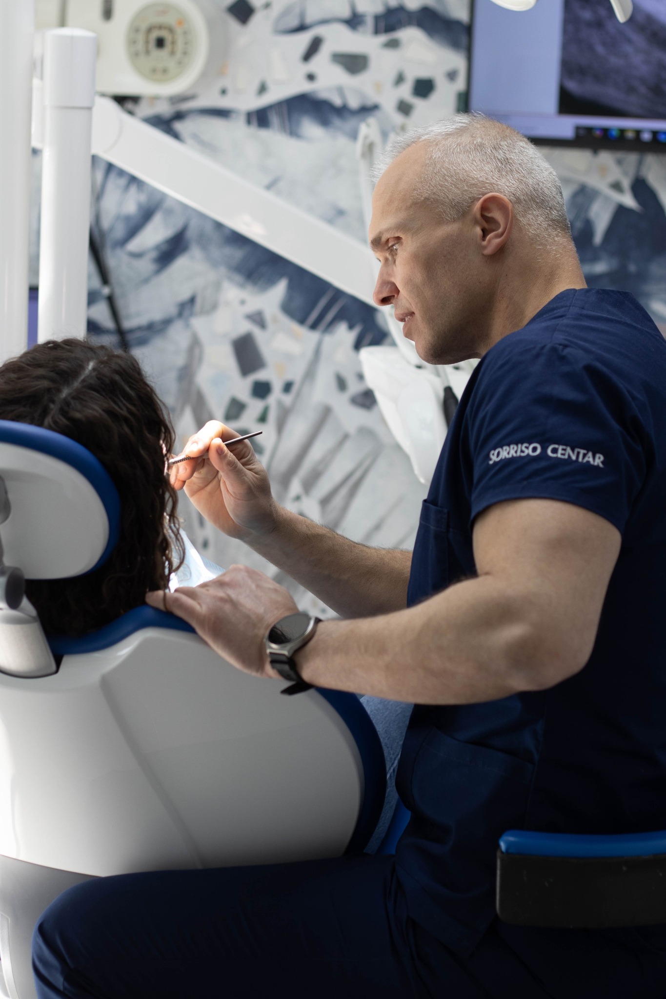 Dentist providing professional dental care to patient